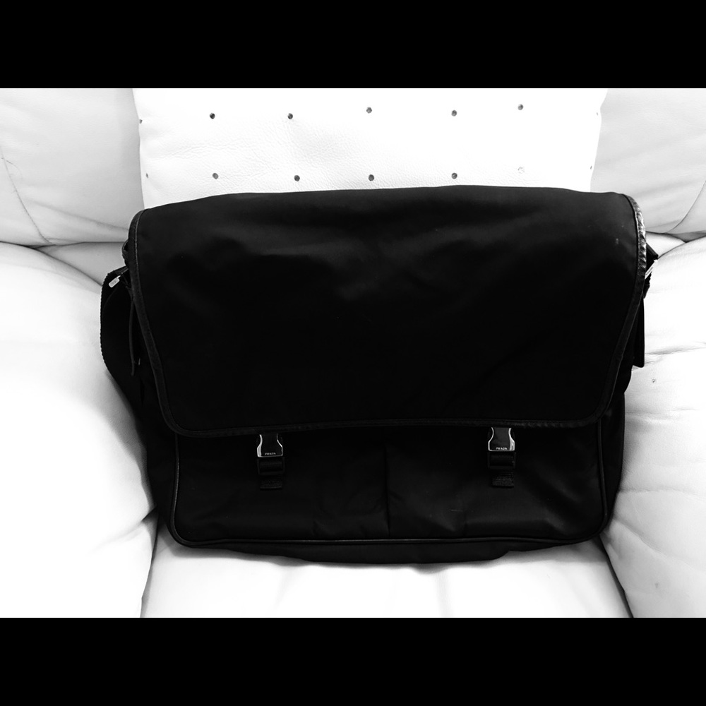 Authentic Prada messenger bag- logo on buckle.